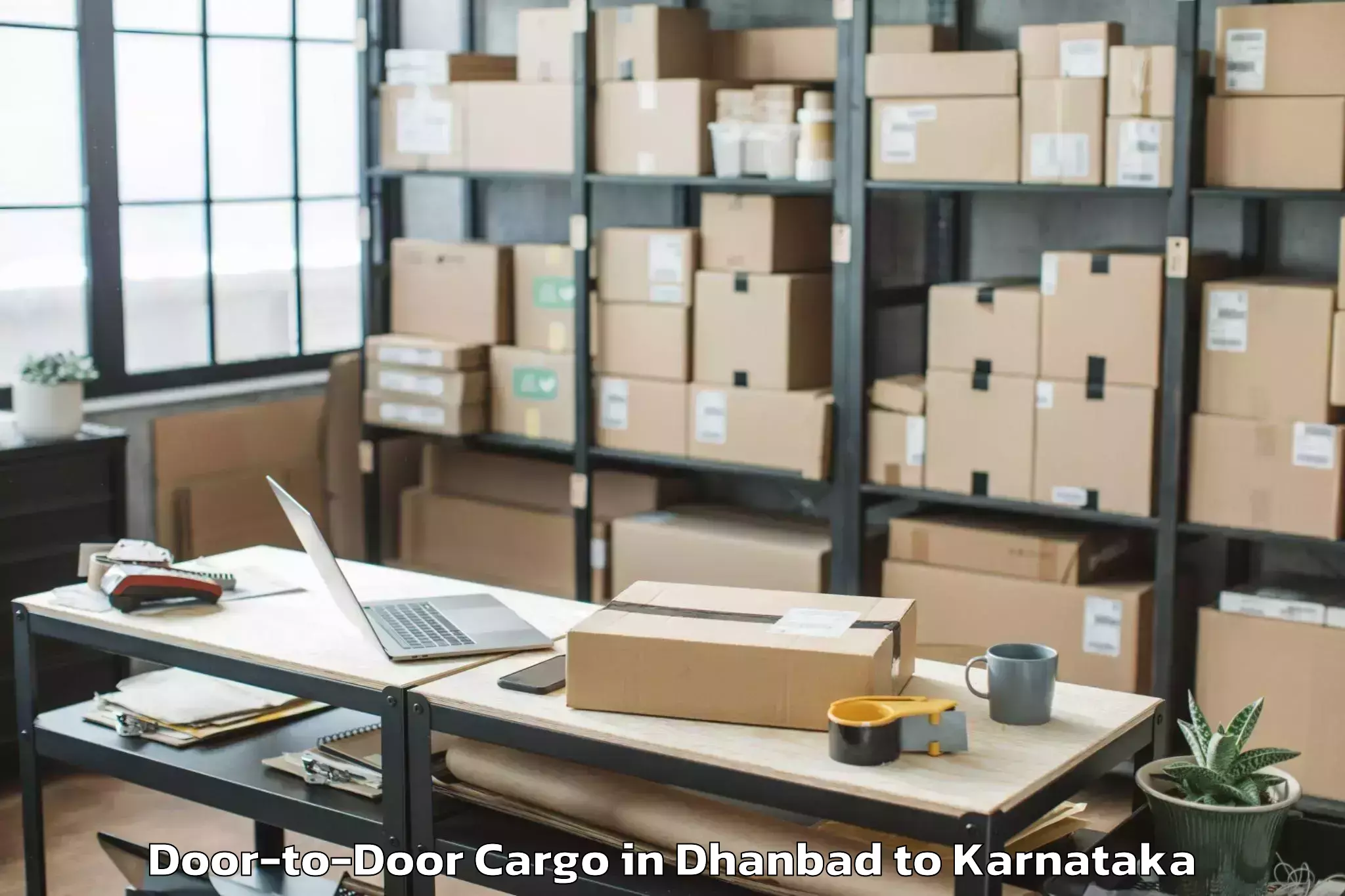 Top Dhanbad to Royal Meenakshi Mall Door To Door Cargo Available